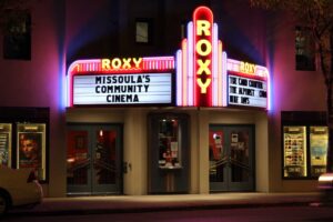 The Roxy Theater marquee lit up in neon.