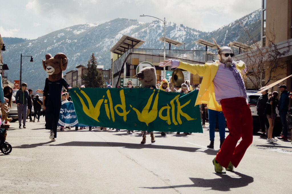 People dressed up in animal costumes at the 2023 WildWalk festival in Missoula, Montana.