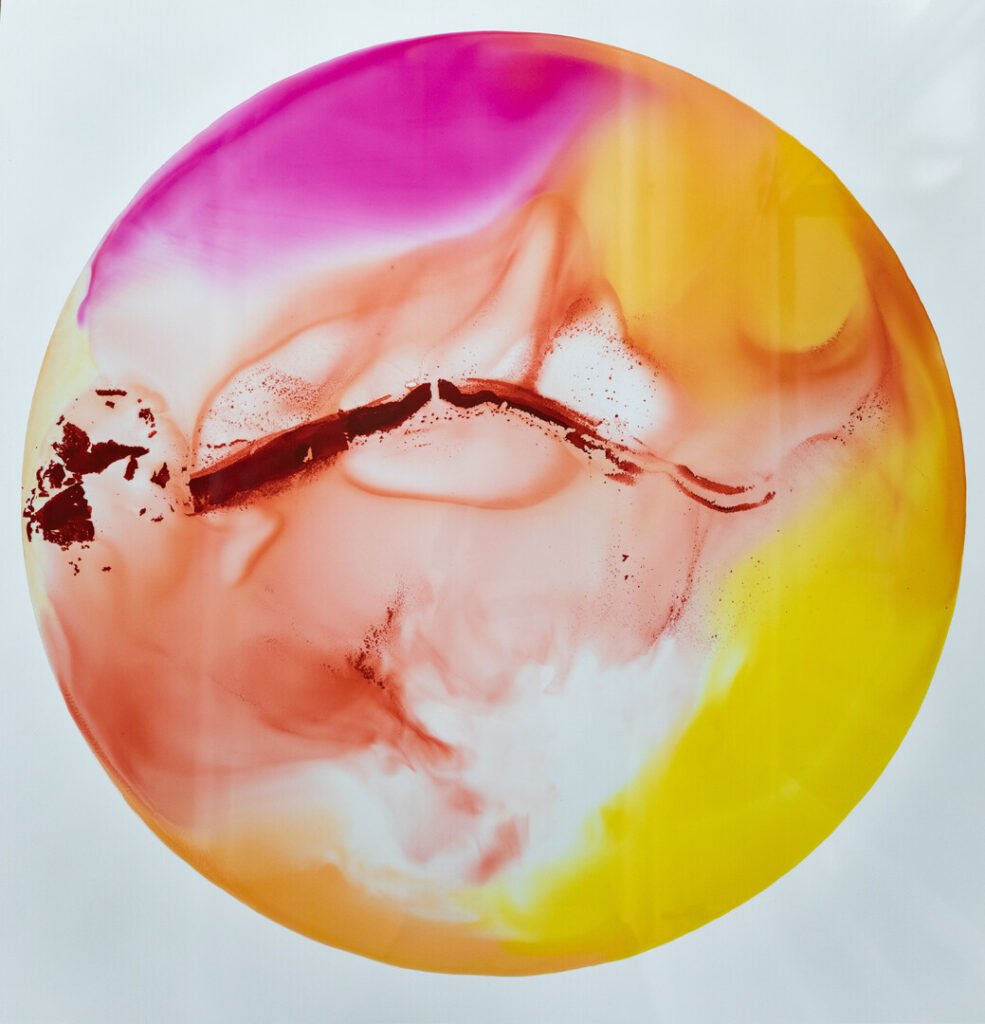 Artwork with pinks oranges and yellows on white background