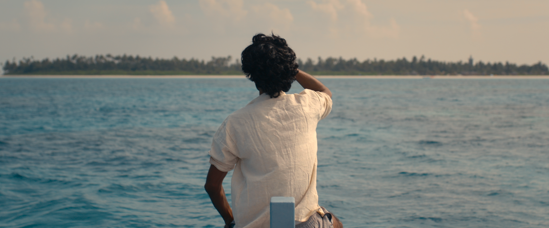 Person looking out over water.