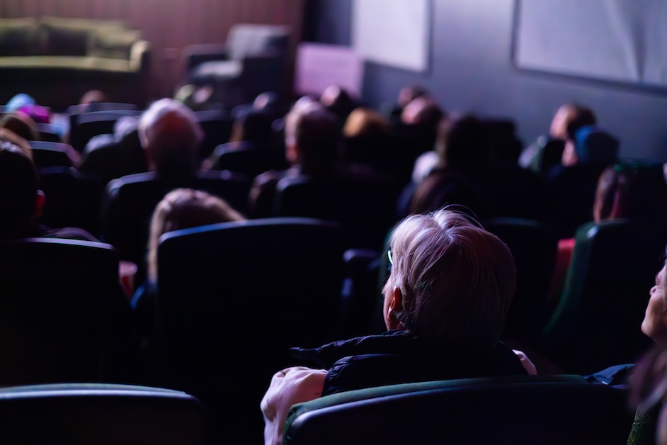 Image of people sitting in movie theater.