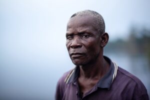 Person looks towards camera.