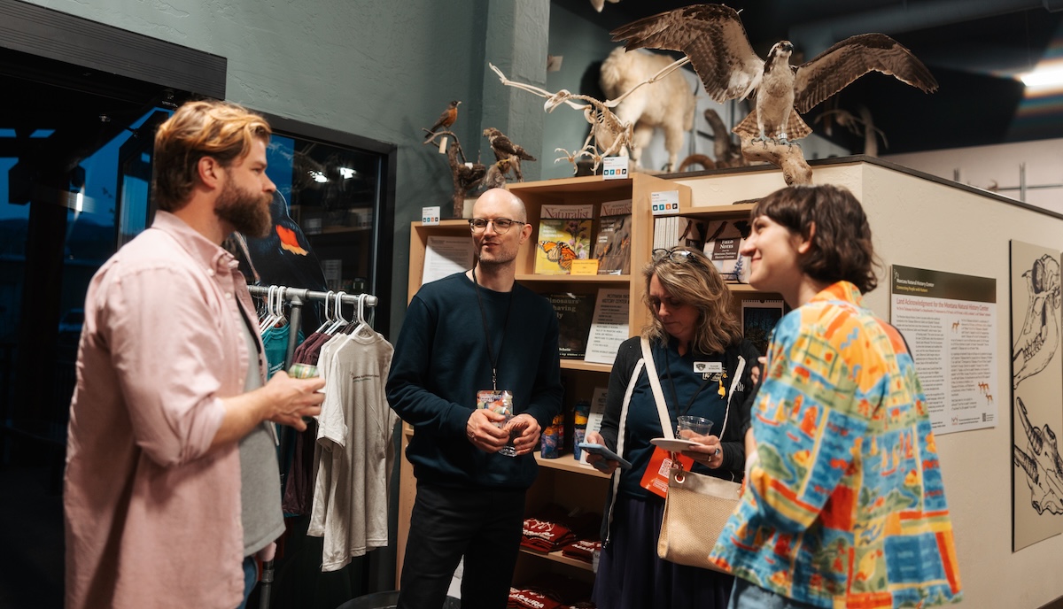 People chatting at party.