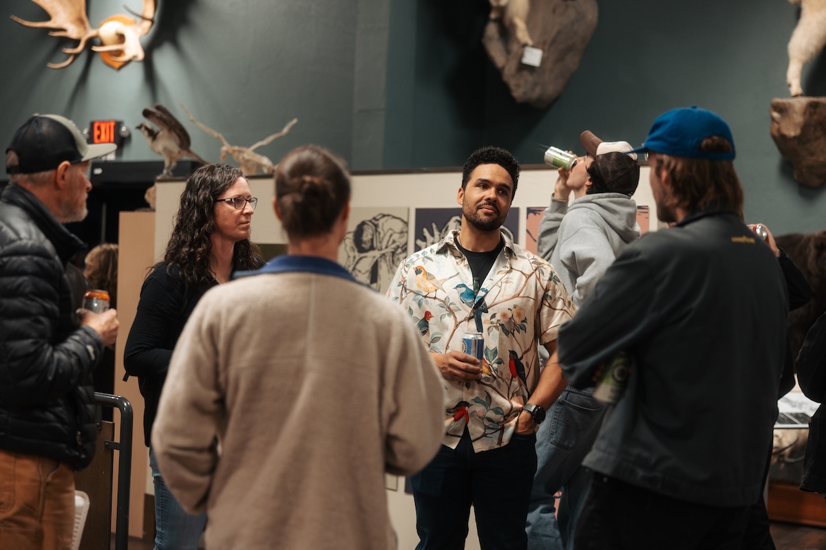 People talking at party.