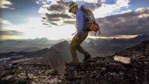 Person hiking in mountains.