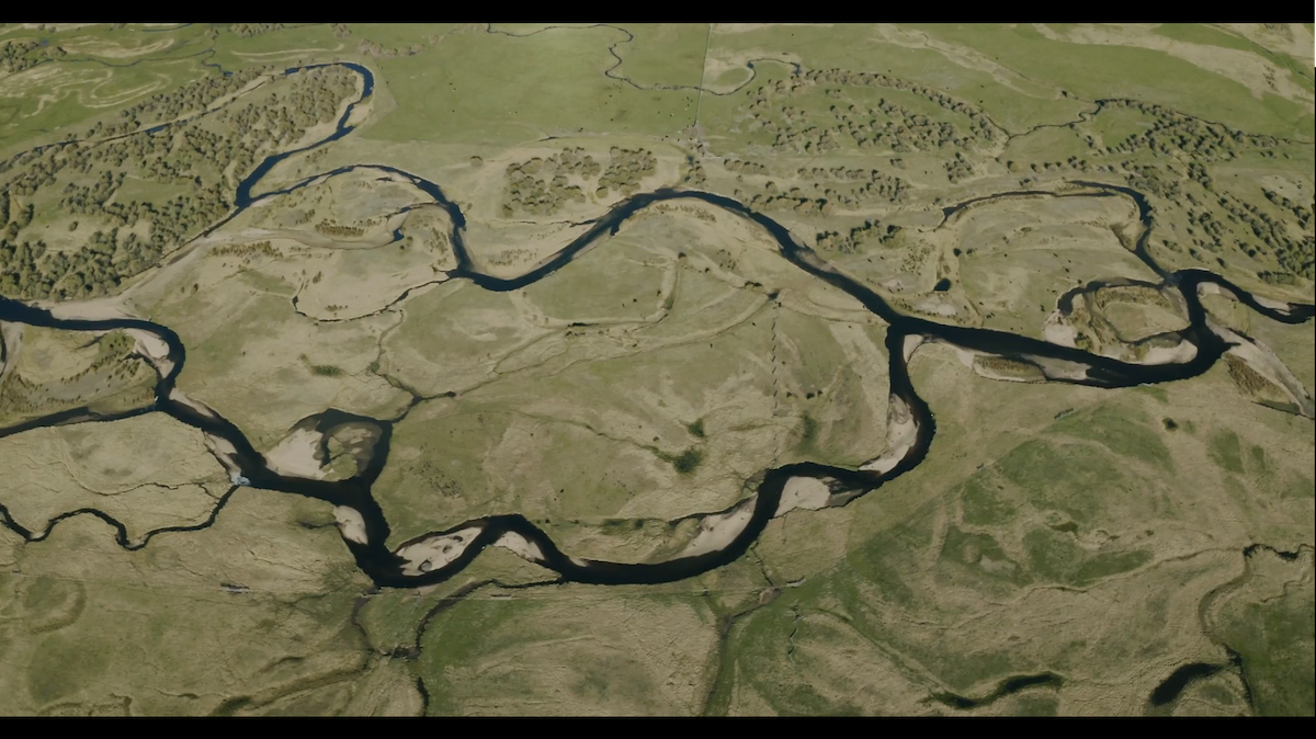 Aerial view of waters and land.